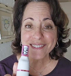 Helen T. holding Pluxy Epil Pro 3.0